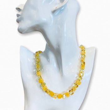 Necklace of opaque and transparent amber cubes