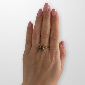 Cherry amber ring in the shape of an ideal ball