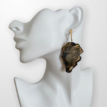 Amber earrings in natural jagged shape with impressive patterns