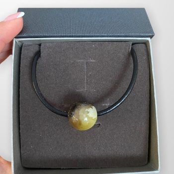 Dark and light colour combination spherical amber necklace on leather cord