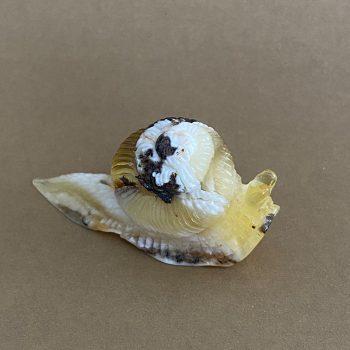 Amber snail figurine