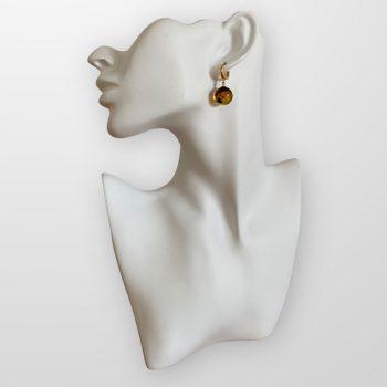 Moss amber earrings in the shape of perfect balls