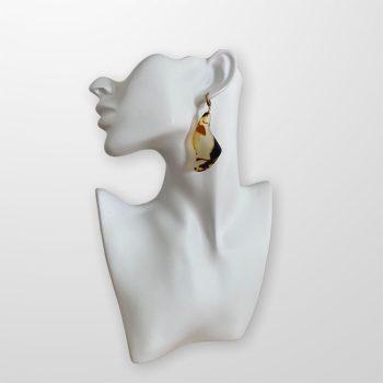 Stylish matt amber earrings in wavy shapes