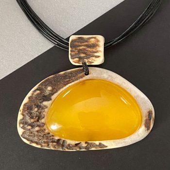 Massive elk horn and marine amber necklace on leather cord
