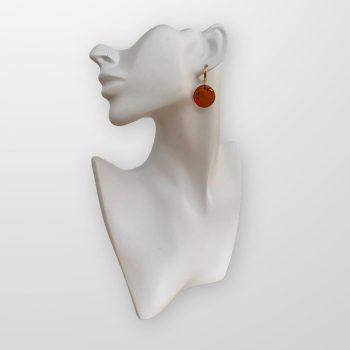 Stylish flat round cherry amber earrings