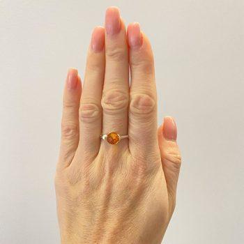 Gorgeous faceted amber ring in honey colour