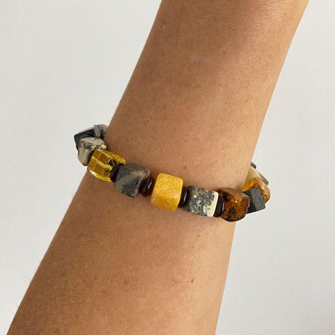 Stylish amber bracelet with multicoloured amber cubes and dark amber discs