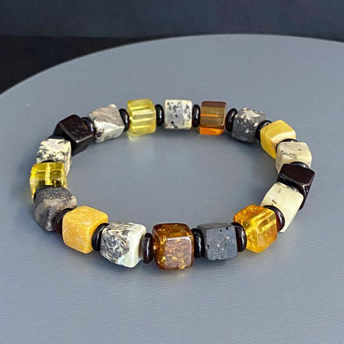 Stylish amber bracelet with multicoloured amber cubes and dark amber discs