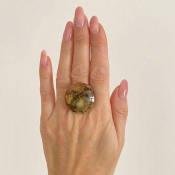 Stylish amber ring and earrings set with expressive patterns in the shape of a tablet