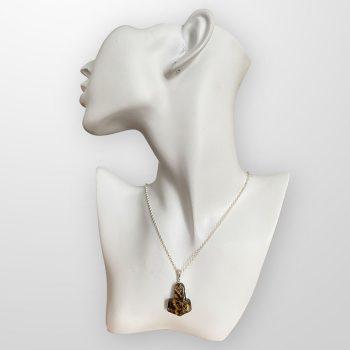 Stylish Viking symbolism speckled amber necklace