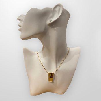 A gorgeous and delicate moose horn and expressive yellow amber neck pendant