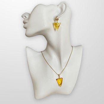 Stylish set of smooth triangular amber stud earrings and necklace pendant