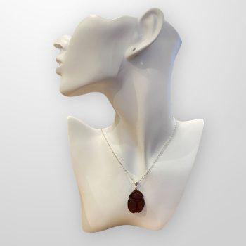 Stylish and artistic engraved amber necklace