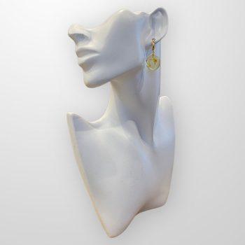 Fine amulet-shaped water clear amber earrings
