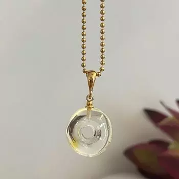 Stilingas apvalus vandens skaidrumo gintaro amuletas