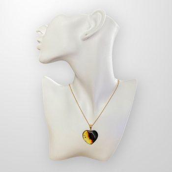 Stylish and youthful amber heart necklace in light and cognac shades