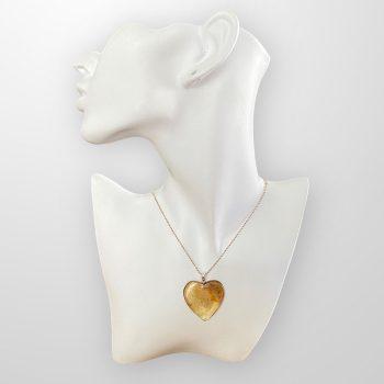 Stylish and youthful amber heart pendant with dots