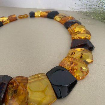 Expressive collé of multicoloured amber details cut at different angles