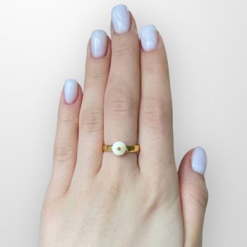 Fine royal amber ring with golden accent detail