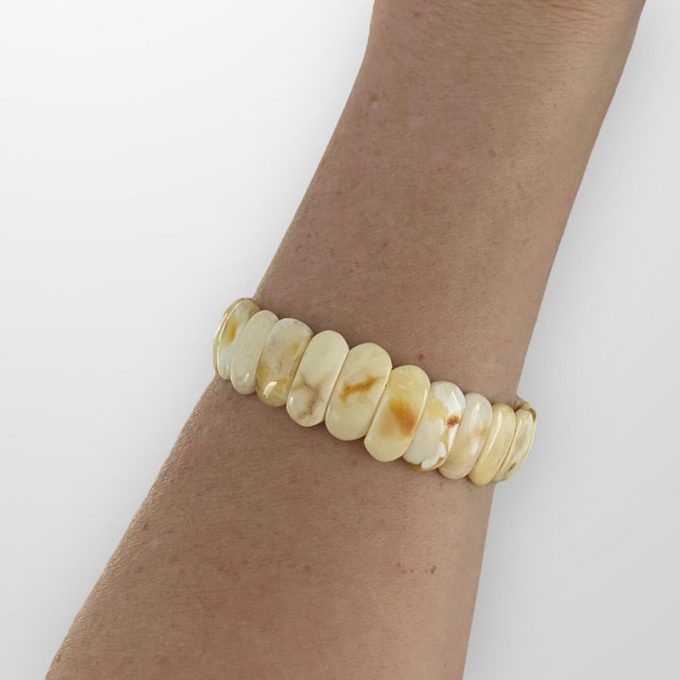 Expressive landscape amber bracelet in abstract smooth shapes