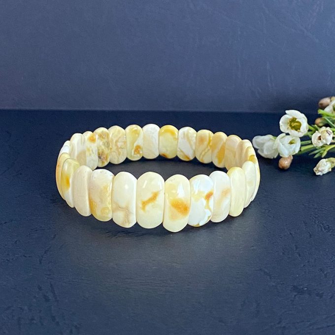 Expressive landscape amber bracelet in abstract smooth shapes