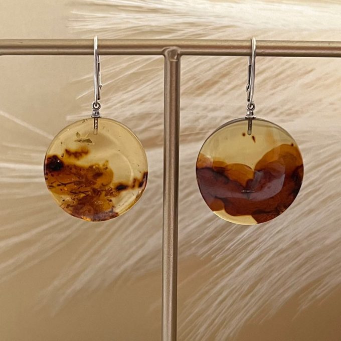 Stylish flat round clear cognac amber earrings