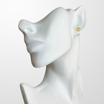 Stylish and youthful ball-shaped matt yellow amber earrings
