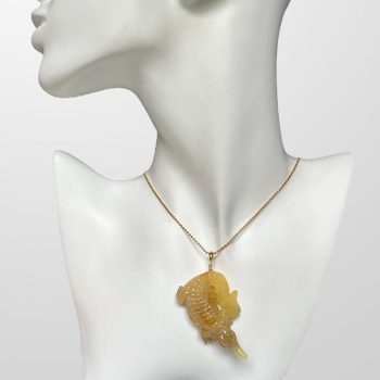 Fine engraved crocodile-shaped yellow amber necklace