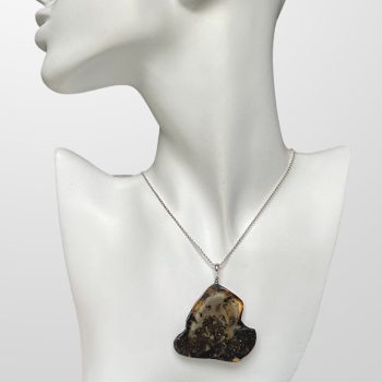 Expressive abstract necklace in dark yellow amber