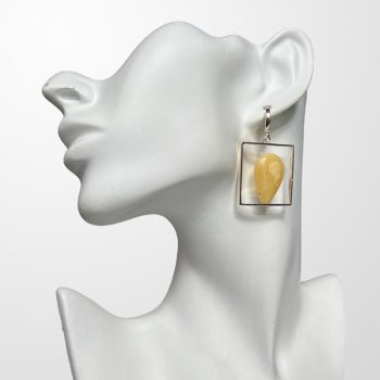 Expressive cut drop earrings in yellow amber set in a cube frame