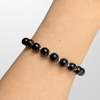 Youthful bracelet with black shiny amber bubbles