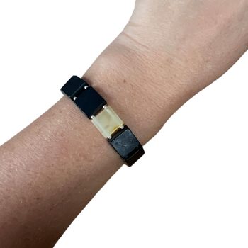 Youthful dark amber tile bracelet with a yellowish brick in the centre