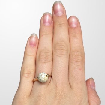 Youthful yellow faceted amber bubble ring