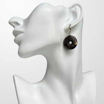 Charming amulet-shaped earrings in dark amber