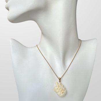 Fine engraved white amber turtle necklace