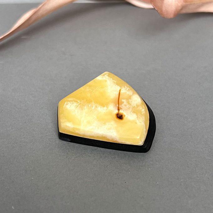 Expressive abstract amber and black oak brooch