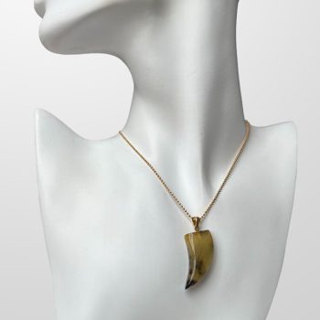 Stylish tusk-shaped yellow amber neck pendant