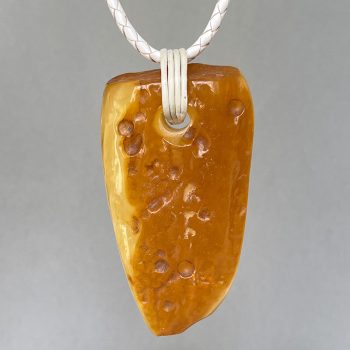 Impressive landscape amber pendant with natural inclusions and bark