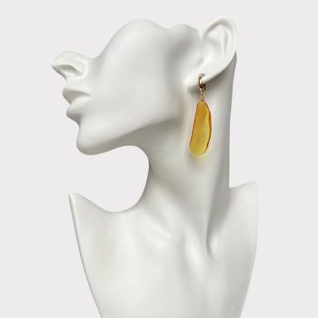 Fine cut yellow amber earrings with natural vein