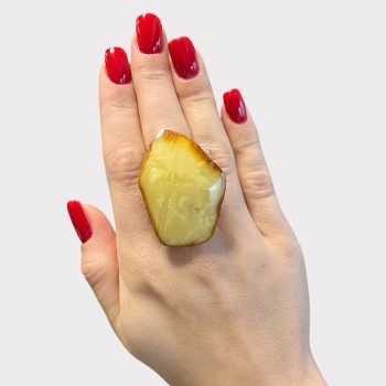 Solid rich yellow amber ring with natural bark