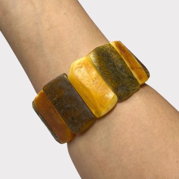 Delicate light amber bracelet with natural bark