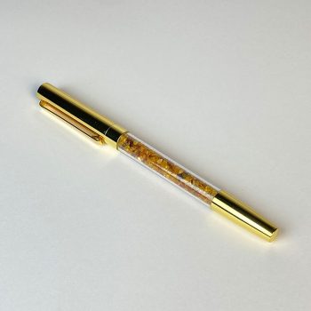 Gold colour pen with amber pieces