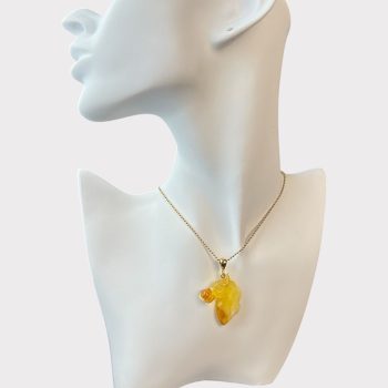 Stylish engraved yellow amber pendant for the Earthling