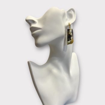 Stylish elongated earrings in shiny speckled amber