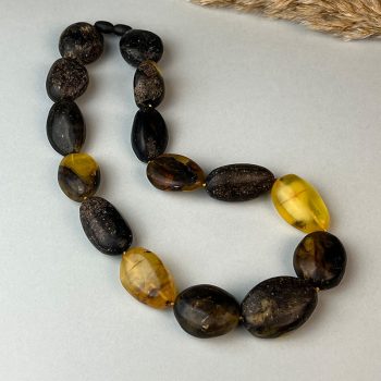 Charming massive necklace in frosted clear and mossy amber