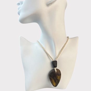 Fine frosted amber neck pendant on linen cord