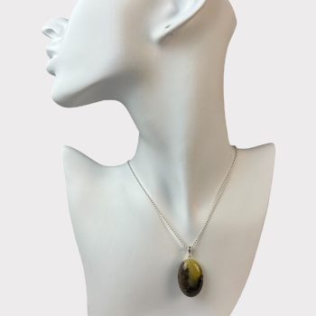 Elegant oval greenish amber neck pendant