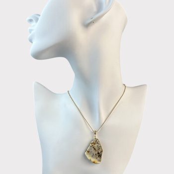 Expressive abstract shape speckled amber necklace