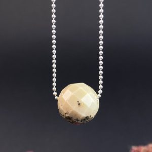 Stilingas 1.6 cm skersmens facetuoto margo gintaro kaklo pakabukas