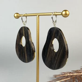 Expressive pear-shaped black oak and landscape amber earrings